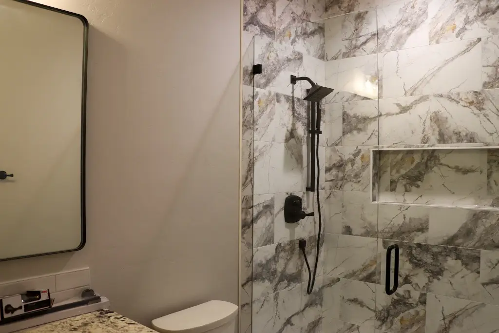 Walk-in shower with frameless glass