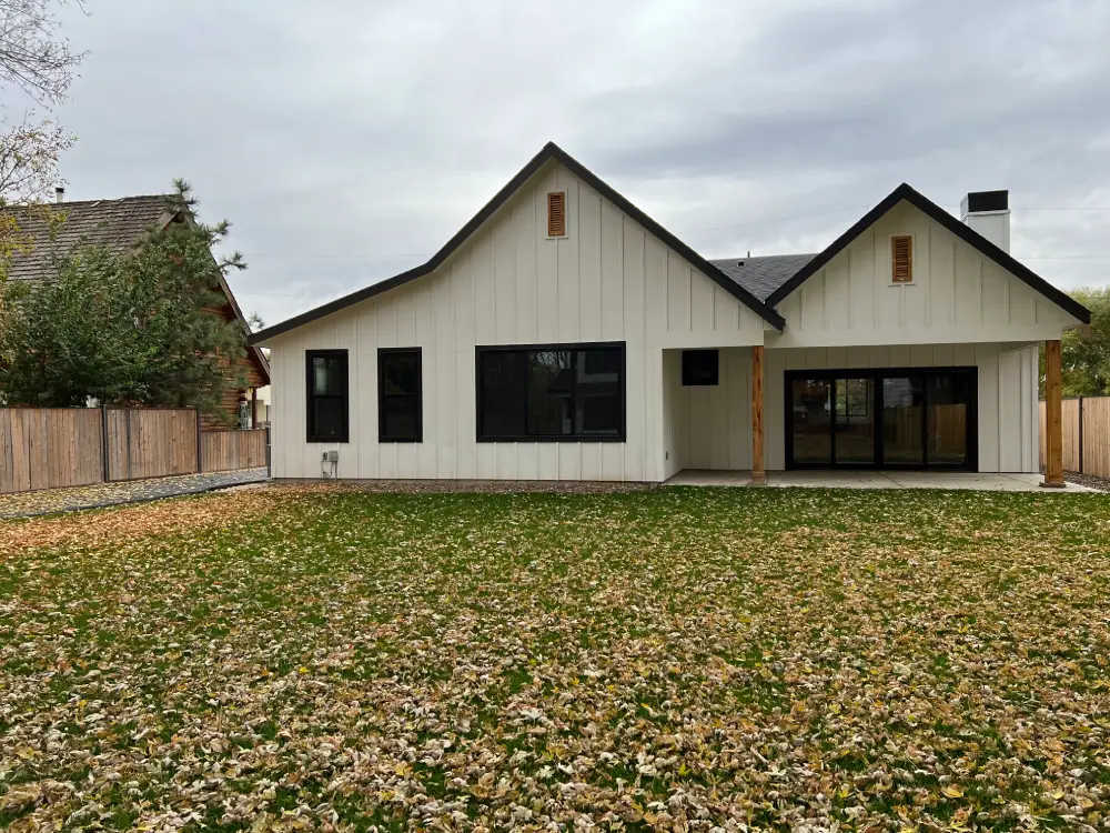 Farmhouse secondary angle — massing and roofline