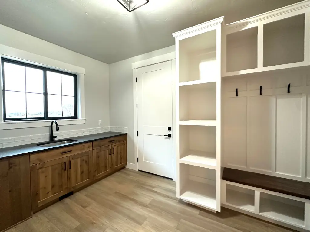 Finished mudroom with built-in storage